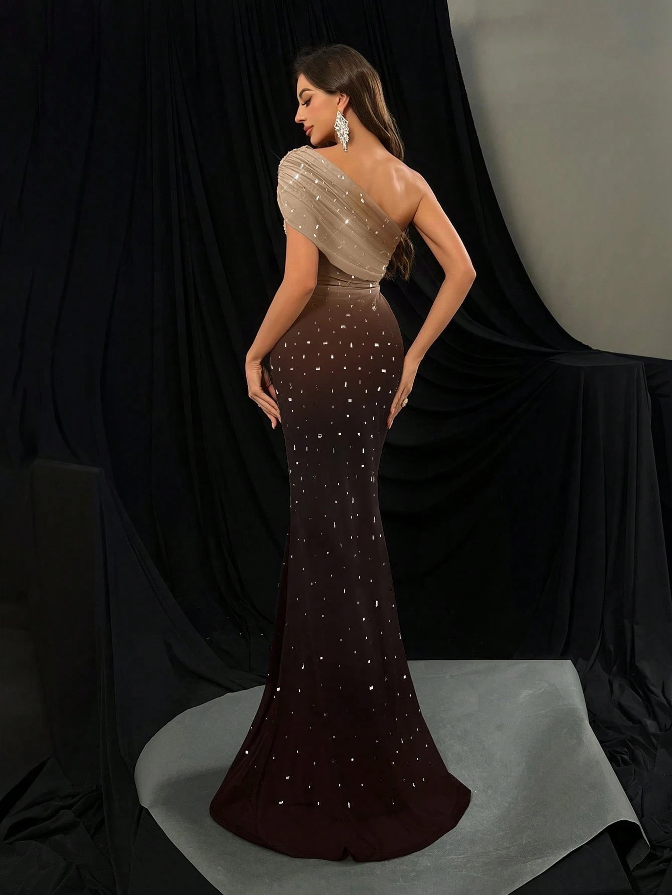 QOQ Women's Solid Color Formal Evening Gown with Asymmetrical Neckline and Rhinestone Accents for Graduation, Galas, and Red Carpet Events